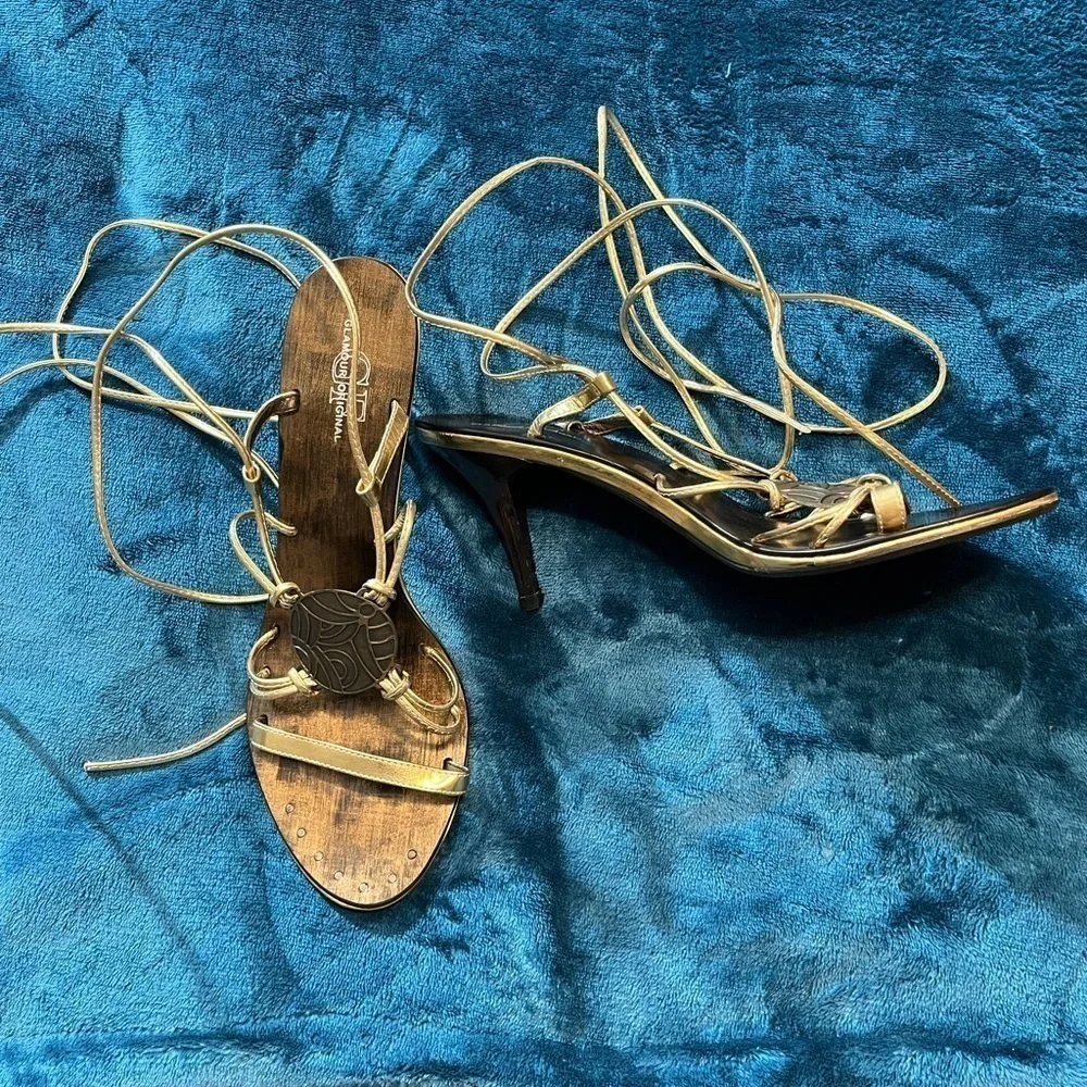Sandals by Glamour Original! Lace up/wrap around the leg. Gold color!